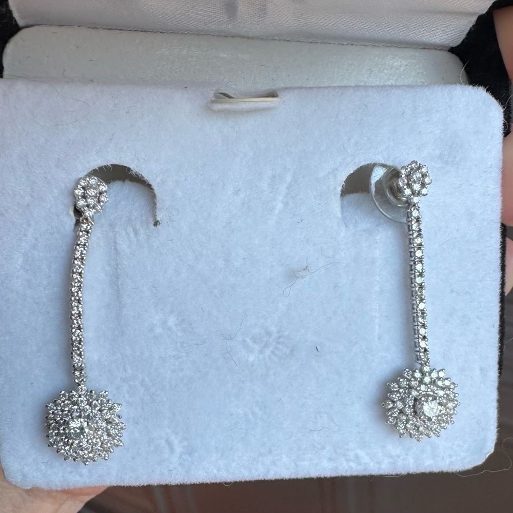 14k white gold and natural diamond drop earrings.
